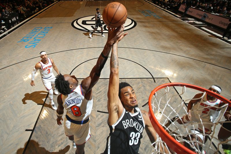 BROOKLYN, NY - JANUARY 23: Nicolas Claxton #33 of the Brooklyn Nets drives to the basket during the game against the New York Knicks on January 23, 2024 at Barclays Center in Brooklyn, New York. NOTE TO USER: User expressly acknowledges and agrees that, by downloading and or using this Photograph, user is consenting to the terms and conditions of the Getty Images License Agreement. Mandatory Copyright Notice: Copyright 2024 NBAE (Photo by Nathaniel S. Butler/NBAE via Getty Images)