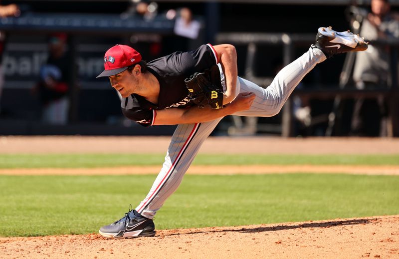 Feb 26, 2024; Tampa, Florida, USA;  Minnesota Twins pitcher Ryan Jensen (77) throws a pitch during the fifth inning against the New York Yankees at George M. Steinbrenner Field. Mandatory Credit: Kim Klement Neitzel-USA TODAY Sports