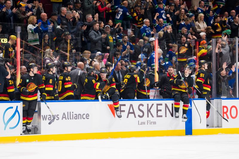 Jan 20, 2024; Vancouver, British Columbia, CAN; The Vancouver Canucks celebrate their victory against the Toronto Maple Leafs at Rogers Arena. Canucks won 6-4. Mandatory Credit: Bob Frid-USA TODAY Sports