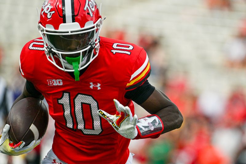 Sep 30, 2023; College Park, Maryland, USA; Maryland Terrapins wide receiver Tai Felton (10) runs for a touchdown during the first half against the Indiana Hoosiers  at SECU Stadium. Mandatory Credit: Tommy Gilligan-USA TODAY Sports