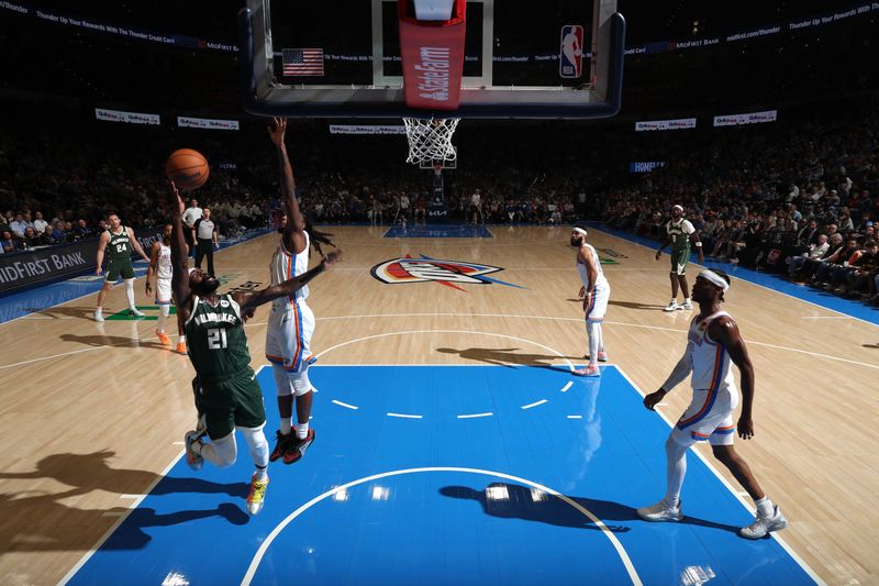 OKLAHOMA CITY, OK - APRIL 12: Patrick Beverley #21 of the Milwaukee Bucks shoots the ball during the game against the Oklahoma City Thunder on April 12, 2024 at Paycom Arena in Oklahoma City, Oklahoma. NOTE TO USER: User expressly acknowledges and agrees that, by downloading and or using this photograph, User is consenting to the terms and conditions of the Getty Images License Agreement. Mandatory Copyright Notice: Copyright 2024 NBAE (Photo by Zach Beeker/NBAE via Getty Images)