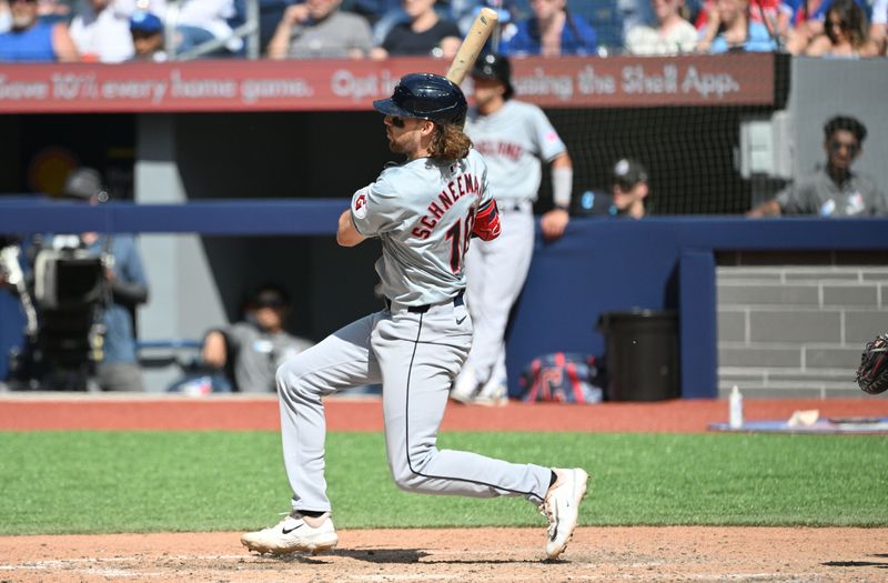 Jun 16, 2024; Toronto, Ontario, CAN;  Cleveland Guardians third baseman Daniel Schneemann (10) hits a single against the Toronto Blue Jays in the ninth inning at Rogers Centre. Mandatory Credit: Dan Hamilton-USA TODAY Sports