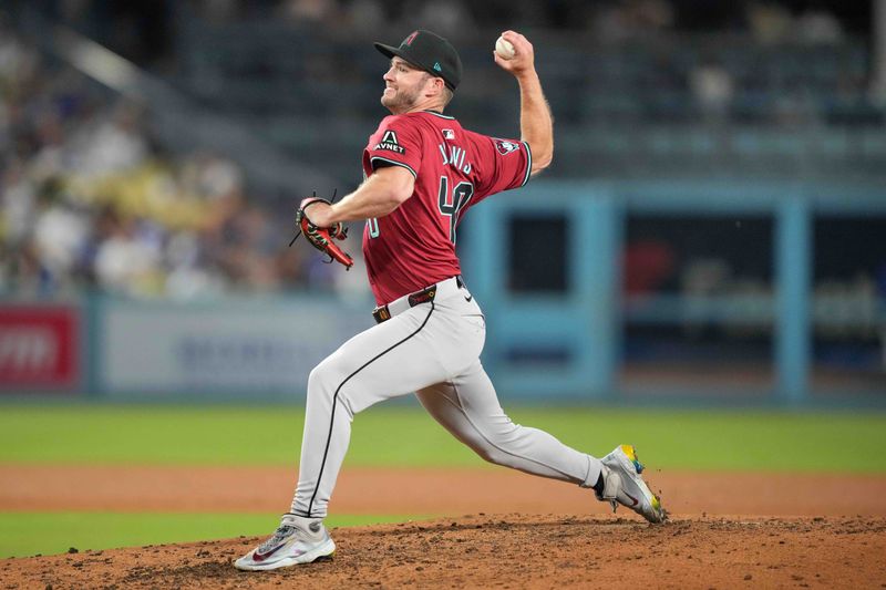 Jul 3, 2024; Los Angeles, California, USA; Arizona Diamondbacks relief pitcher Bryce Jarvis (40)  throws in the sixth inning against the Los Angeles Dodgers at Dodger Stadium. Mandatory Credit: Kirby Lee-USA TODAY Sports