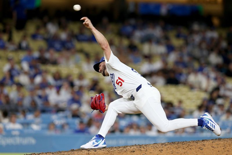 Jul 23, 2024; Los Angeles, California, USA; Los Angeles Dodgers pitcher Alex Vesia (51) throws during the ninth inning against the San Francisco Giants at Dodger Stadium. Mandatory Credit: Jason Parkhurst-USA TODAY Sports