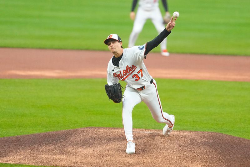 May 28, 2025; Baltimore, Maryland, USA; Baltimore Orioles pitcher Cade Povich (37) delivers a pitch against the St. Louis Cardinals during the first inning at Oriole Park at Camden Yards. Mandatory Credit: Gregory Fisher-Imagn Images
