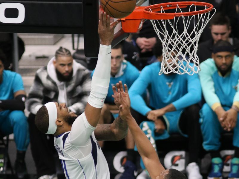 CHARLOTTE, NC - APRIL 9: Daniel Gafford #21 of the Dallas Mavericks shoots the ball during the game against the Charlotte Hornets on April 9, 2024 at Spectrum Center in Charlotte, North Carolina. NOTE TO USER: User expressly acknowledges and agrees that, by downloading and or using this photograph, User is consenting to the terms and conditions of the Getty Images License Agreement. Mandatory Copyright Notice: Copyright 2024 NBAE (Photo by Brock Williams-Smith/NBAE via Getty Images)