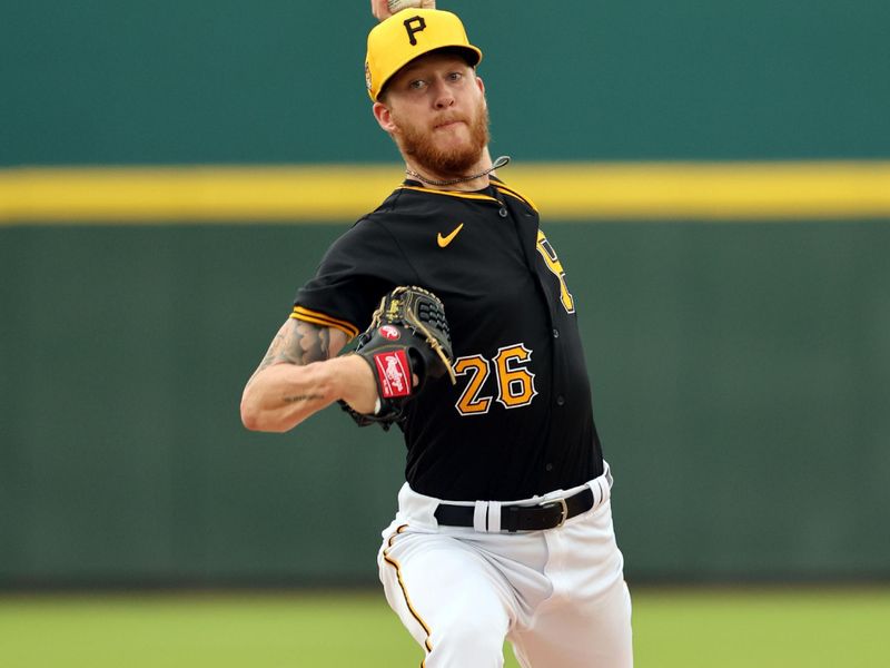 Mar 21, 2024; Bradenton, Florida, USA; Pittsburgh Pirates starting pitcher Bailey Falter (26) throws a pitch during the first inning against the Toronto Blue Jays at LECOM Park. Mandatory Credit: Kim Klement Neitzel-USA TODAY Sports