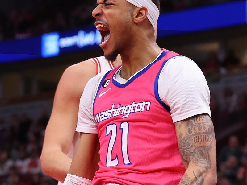 CHICAGO, ILLINOIS - FEBRUARY 26: Daniel Gafford #21 of the Washington Wizards celebrates a dunk against the Chicago Bulls during the first half at United Center on February 26, 2023 in Chicago, Illinois. NOTE TO USER: User expressly acknowledges and agrees that, by downloading and or using this photograph, User is consenting to the terms and conditions of the Getty Images License Agreement.  (Photo by Michael Reaves/Getty Images)