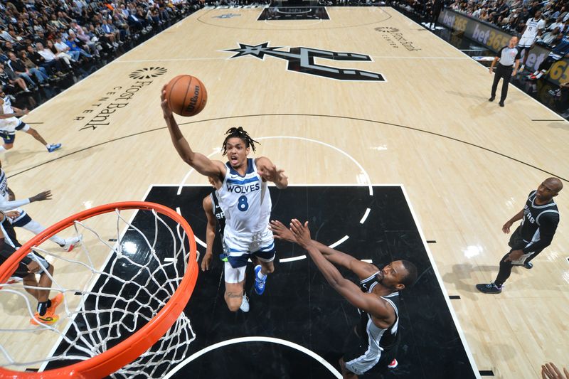 SAN ANTONIO, TX - NOVEMBER 2: Josh Minott #8 of the Minnesota Timberwolves drives to the basket during the game against the San Antonio Spurs on November 2, 2024 at the Frost Bank Center in San Antonio, Texas. NOTE TO USER: User expressly acknowledges and agrees that, by downloading and or using this photograph, user is consenting to the terms and conditions of the Getty Images License Agreement. Mandatory Copyright Notice: Copyright 2024 NBAE (Photos by Michael Gonzales/NBAE via Getty Images)