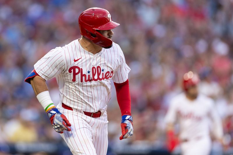 Jul 9, 2024; Philadelphia, Pennsylvania, USA; Philadelphia Phillies designated hitter Kyle Schwarber (12) runs the bases after hitting a 2 RBI single during the second inning against the Los Angeles Dodgers at Citizens Bank Park. Mandatory Credit: Bill Streicher-USA TODAY Sports