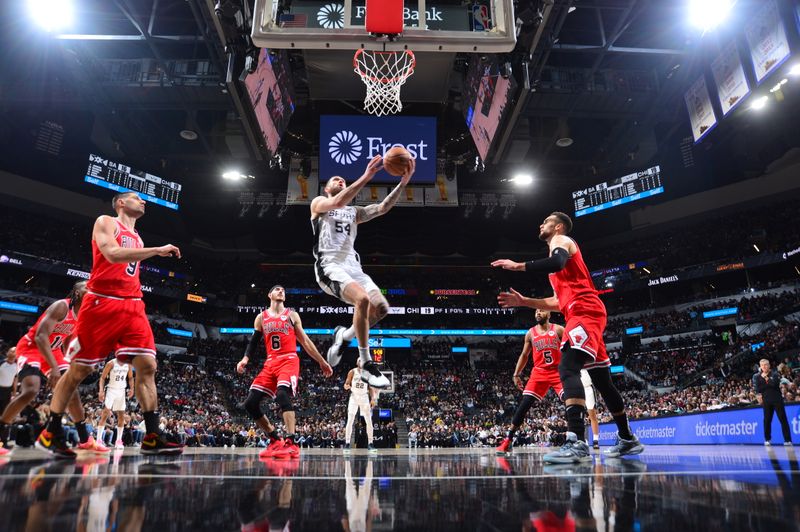 SAN ANTONIO, TX - JANUARY 13: Sandro Mamukelashvili #54 of the San Antonio Spurs drives to the basket during the game against the Chicago Bulls on January 13, 2024 at the Frost Bank Center in San Antonio, Texas. NOTE TO USER: User expressly acknowledges and agrees that, by downloading and or using this photograph, user is consenting to the terms and conditions of the Getty Images License Agreement. Mandatory Copyright Notice: Copyright 2024 NBAE (Photos by Michael Gonzales/NBAE via Getty Images)