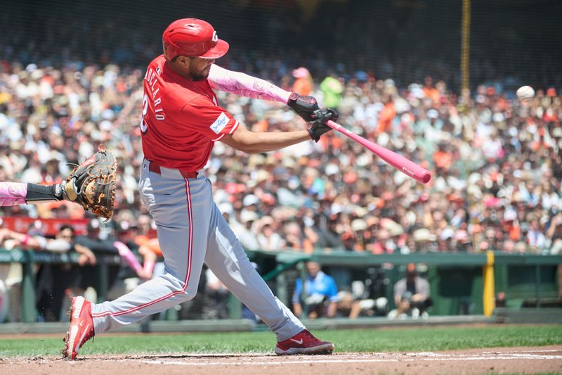 May 12, 2024; San Francisco, California, USA; Cincinnati Reds infielder Jeimer Candelario (3) hits an RBI double against the San Francisco Giants during the first inning at Oracle Park. Mandatory Credit: Robert Edwards-USA TODAY Sports