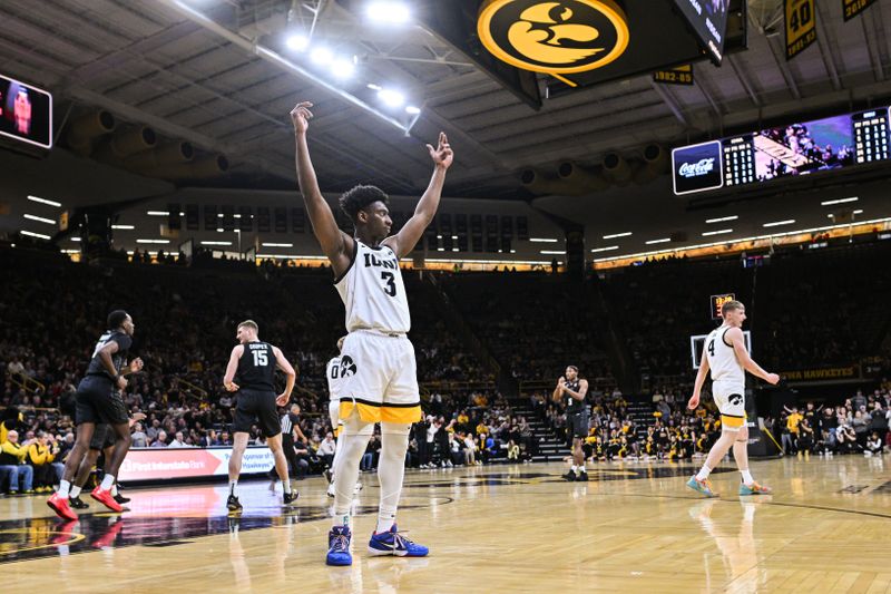 Mar 6, 2025; Iowa City, Iowa, USA; Iowa Hawkeyes guard Drew Thelwell (3) reacts during the first half against the Michigan State Spartans at Carver-Hawkeye Arena. Mandatory Credit: Jeffrey Becker-Imagn Images