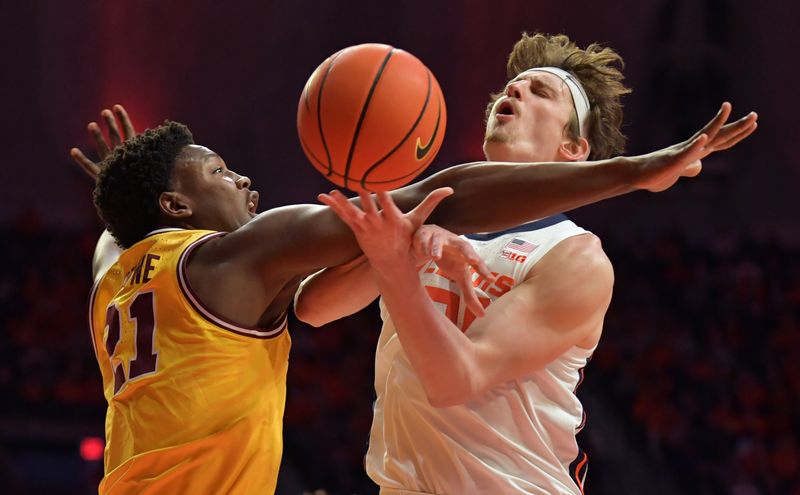 Feb 20, 2023; Champaign, Illinois, USA;  Minnesota Golden Gophers forward Pharrel Payne (21) knocks the ball from Illinois Fighting Illini forward Matthew Mayer (24) during the first half at State Farm Center. Mandatory Credit: Ron Johnson-USA TODAY Sports