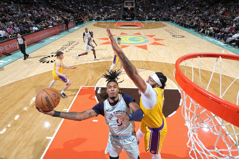 SAN ANTONIO, TX - NOVEMBER 27: Stephon Castle #5 of the San Antonio Spurs drives to the basket during the game against the Los Angeles Lakers on November 27, 2024 at the Frost Bank Center in San Antonio, Texas. NOTE TO USER: User expressly acknowledges and agrees that, by downloading and or using this photograph, user is consenting to the terms and conditions of the Getty Images License Agreement. Mandatory Copyright Notice: Copyright 2024 NBAE (Photos by Jeff Haynes/NBAE via Getty Images)