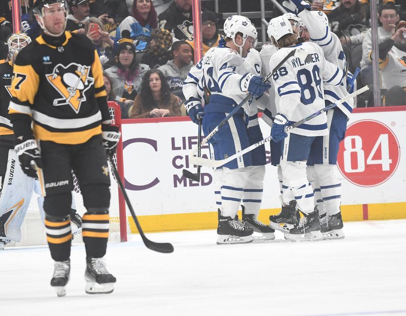 Nov 25, 2023; Pittsburgh, Pennsylvania, USA; The Toronto Maple Leafs celebrate a first period goal against the Pittsburgh Penguins during the first period at PPG Paints Arena. Mandatory Credit: Philip G. Pavely-USA TODAY Sports