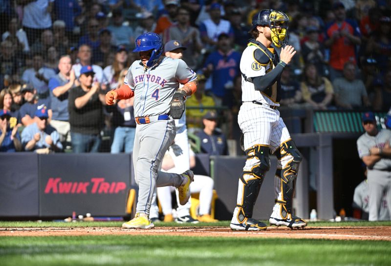 Sep 29, 2024; Milwaukee, Wisconsin, USA; New York Mets catcher Francisco Alvarez (4) scores a run against the Milwaukee Brewers in the fourth inning at American Family Field. Mandatory Credit: Michael McLoone-Imagn Images