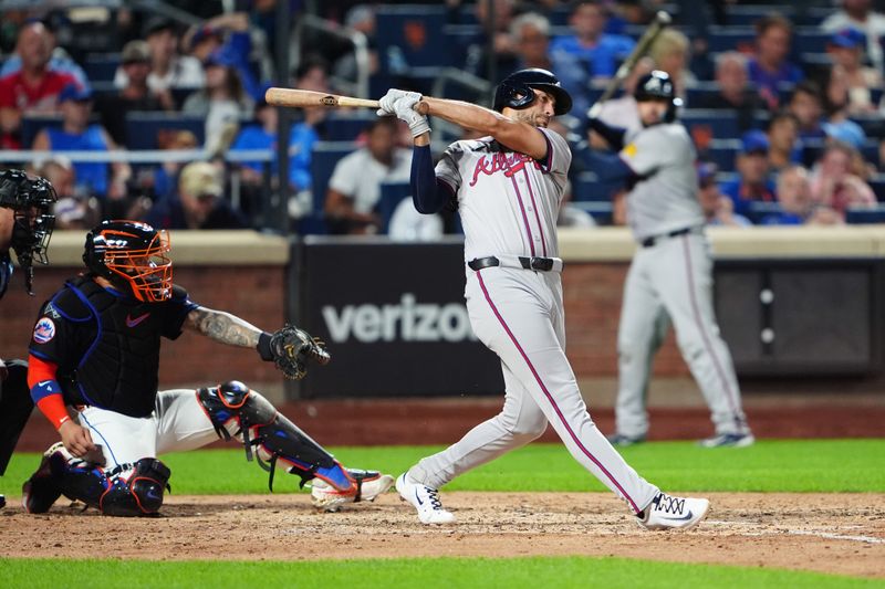 Jul 25, 2024; New York City, New York, USA; Atlanta Braves first baseman Matt Olson (28) hits a single against the New York Mets during the sixth inning at Citi Field. Mandatory Credit: Gregory Fisher-USA TODAY Sports