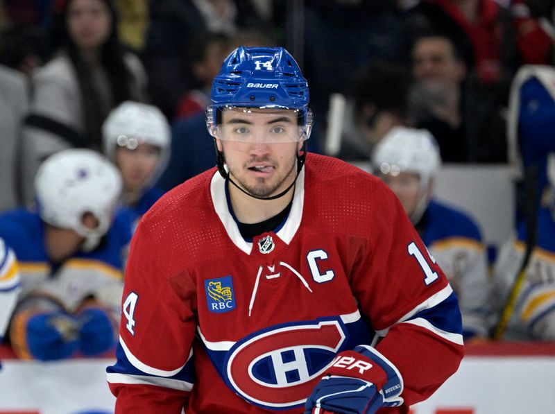 Feb 21, 2024; Montreal, Quebec, CAN; Montreal Canadiens forward Nick Suzuki (14) during the third period of the game against the Buffalo Sabres at the Bell Centre. Mandatory Credit: Eric Bolte-USA TODAY Sports