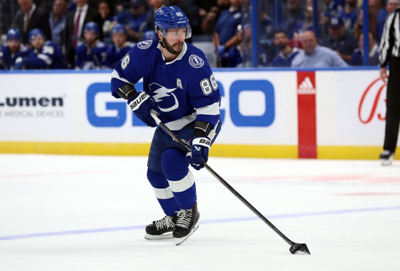 Dec 19, 2023; Tampa, Florida, USA; Tampa Bay Lightning right wing Nikita Kucherov (86) skates against the St. Louis Blues during the third period at Amalie Arena. Mandatory Credit: Kim Klement Neitzel-USA TODAY Sports