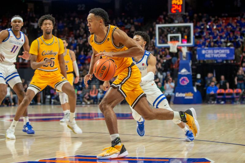 Feb 11, 2023; Boise, Idaho, USA; Wyoming Cowboys guard Xavier DuSell (53) drive to the basket during the first half against the Boise State Broncos at ExtraMile Arena. Mandatory Credit: Brian Losness-USA TODAY Sports
ports