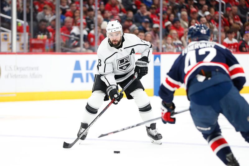 Jan 7, 2024; Washington, District of Columbia, USA; Los Angeles Kings defenseman Drew Doughty (8) watches the puck in front of Washington Capitals defenseman Martin Fehervary (42) during the first period at Capital One Arena. Mandatory Credit: Amber Searls-USA TODAY Sports