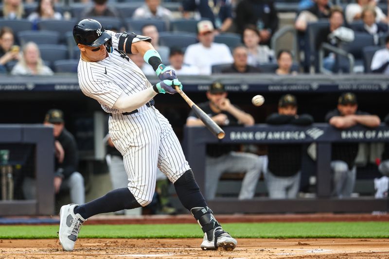 May 17, 2024; Bronx, New York, USA;  New York Yankees center fielder Aaron Judge (99) hits a solo home run in the first inning against the Chicago White Sox at Yankee Stadium. Mandatory Credit: Wendell Cruz-USA TODAY Sports