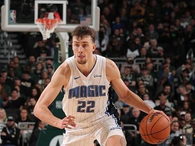 MILWAUKEE, WI - DECEMBER 21:  Franz Wagner #22 of the Orlando Magic handles the ball during the game against the Milwaukee Bucks on December 21, 2023 at the Fiserv Forum Center in Milwaukee, Wisconsin. NOTE TO USER: User expressly acknowledges and agrees that, by downloading and or using this Photograph, user is consenting to the terms and conditions of the Getty Images License Agreement. Mandatory Copyright Notice: Copyright 2023 NBAE (Photo by Gary Dineen/NBAE via Getty Images).