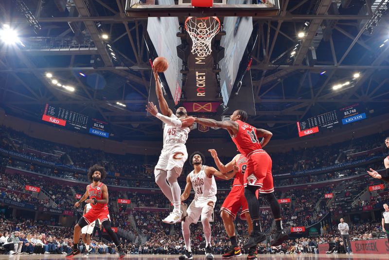 CLEVELAND, OH - JANUARY 15: Donovan Mitchell #45 of the Cleveland Cavaliers drives to the basket during the game against the Chicago Bulls on January 15, 2024 at Rocket Mortgage FieldHouse in Cleveland, Ohio. NOTE TO USER: User expressly acknowledges and agrees that, by downloading and/or using this Photograph, user is consenting to the terms and conditions of the Getty Images License Agreement. Mandatory Copyright Notice: Copyright 2024 NBAE (Photo by David Liam Kyle/NBAE via Getty Images)