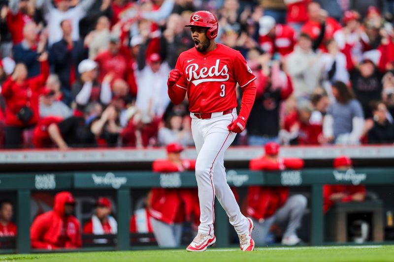 Apr 20, 2024; Cincinnati, Ohio, USA; Cincinnati Reds third baseman Jeimer Candelario (3) scores on a grand slam hit by Cincinnati Reds catcher Tyler Stephenson (not pictured) in the first inning against the Los Angeles Angels at Great American Ball Park. Mandatory Credit: Katie Stratman-USA TODAY Sports