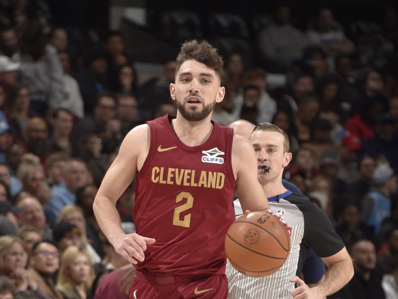 CLEVELAND, OH - FEBRUARY 23: Ty Jerome #2 of the Cleveland Cavaliers dribbles the ball during the game against the Memphis Grizzlies on February 23 , 2025 at Rocket Arena in Cleveland, Ohio. NOTE TO USER: User expressly acknowledges and agrees that, by downloading and/or using this Photograph, user is consenting to the terms and conditions of the Getty Images License Agreement. Mandatory Copyright Notice: Copyright 2025 NBAE (Photo by David Liam Kyle/NBAE via Getty Images)