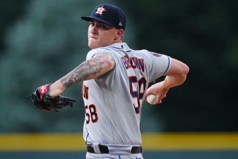 Jul 18, 2023; Denver, Colorado, USA; Houston Astros starting pitcher Hunter Brown (58) delivers a pitch in the first inning against the Colorado Rockies at Coors Field. Mandatory Credit: Ron Chenoy-USA TODAY Sports