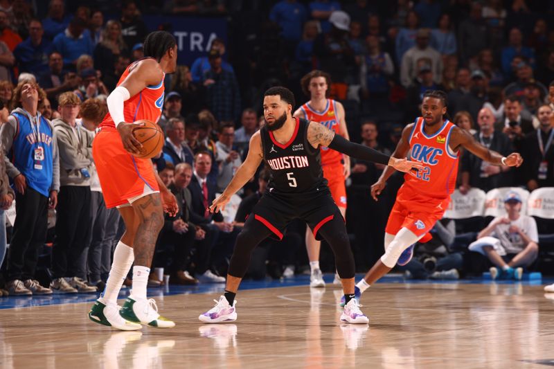 OKLAHOMA CITY, OK - MARCH 27:  Fred VanVleet #5 of the Houston Rockets plays defense against the Oklahoma City Thunder on March 27, 2024 at Paycom Arena in Oklahoma City, Oklahoma. NOTE TO USER: User expressly acknowledges and agrees that, by downloading and or using this photograph, User is consenting to the terms and conditions of the Getty Images License Agreement. Mandatory Copyright Notice: Copyright 2024 NBAE (Photo by Zach Beeker/NBAE via Getty Images)