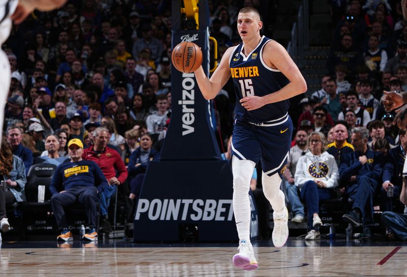 DENVER, CO - MARCH 12: Nikola Jokic #15 of the Denver Nuggets drives to the basket during the game against the Brooklyn Nets on March 12, 2023 at the Ball Arena in Denver, Colorado. NOTE TO USER: User expressly acknowledges and agrees that, by downloading and/or using this Photograph, user is consenting to the terms and conditions of the Getty Images License Agreement. Mandatory Copyright Notice: Copyright 2023 NBAE (Photo by Garrett Ellwood/NBAE via Getty Images)