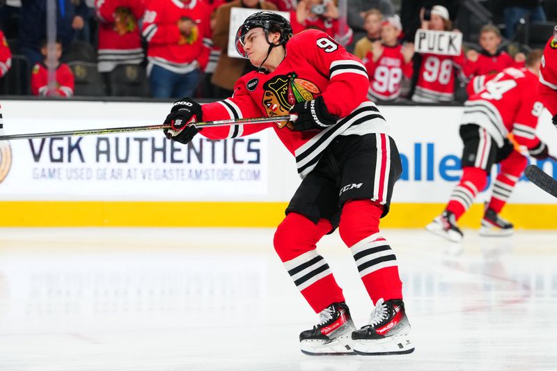 Oct 27, 2023; Las Vegas, Nevada, USA; CChicago Blackhawks center Connor Bedard (98) warms up before a game against the Vegas Golden Knights at T-Mobile Arena. Mandatory Credit: Stephen R. Sylvanie-USA TODAY Sports