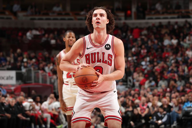 CHICAGO, IL - NOVEMBER 4: Josh Giddey #3 of the Chicago Bulls shoots a free throw during the game against the Utah Jazz on NOVEMBER 4, 2024 at United Center in Chicago, Illinois. NOTE TO USER: User expressly acknowledges and agrees that, by downloading and or using this photograph, User is consenting to the terms and conditions of the Getty Images License Agreement. Mandatory Copyright Notice: Copyright 2024 NBAE (Photo by Gary Dineen/NBAE via Getty Images)