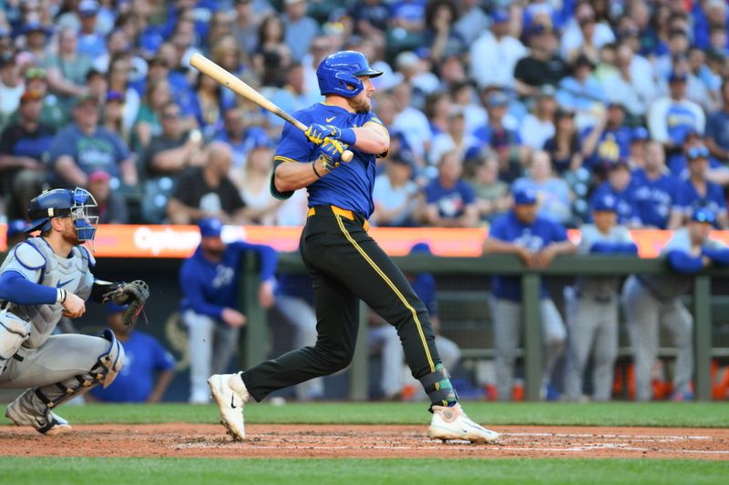 Jul 5, 2024; Seattle, Washington, USA; Seattle Mariners left fielder Luke Raley (20) hits a 2-RBI double against the Toronto Blue Jays during the third inning at T-Mobile Park. Mandatory Credit: Steven Bisig-USA TODAY Sports