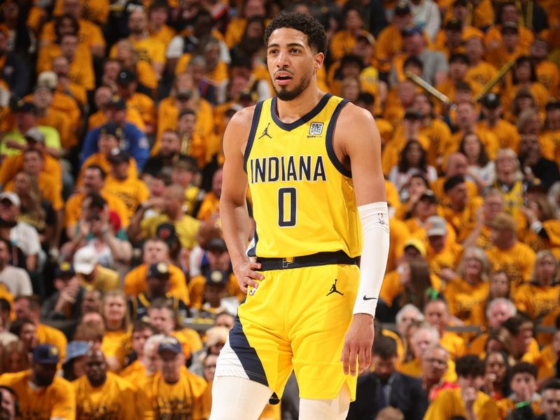INDIANAPOLIS, IN - MAY 25:  Tyrese Haliburton #0 of the Indiana Pacers looks on during the game against the New York Knicks  during Game 3 of the 2025 Eastern Conference Finals on May 25, 2025 at Gainbridge Fieldhouse in Indianapolis, Indiana. NOTE TO USER: User expressly acknowledges and agrees that, by downloading and or using this Photograph, user is consenting to the terms and conditions of the Getty Images License Agreement. Mandatory Copyright Notice: Copyright 2025 NBAE (Photo by Nathaniel S. Butler/NBAE via Getty Images)