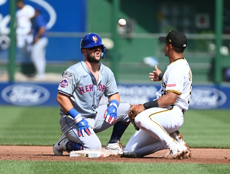 Jul 6, 2024; Pittsburgh, Pennsylvania, USA;  New York Mets base runner reacts after Pittsburgh Pirates second baseman Nick Gonzales (30) tagged him out trying to steal second during the second inning at PNC Park. Mandatory Credit: Philip G. Pavely-USA TODAY Sports