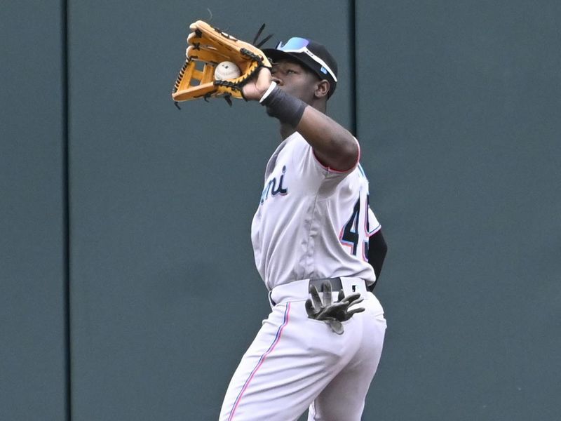 Jun 11, 2023; Chicago, Illinois, USA;  Miami Marlins center fielder Jonathan Davis (49) catches a fly ball hit by Chicago White Sox first baseman Andrew Vaughn (25) during the seventh inning at Guaranteed Rate Field. Mandatory Credit: Matt Marton-USA TODAY Sports