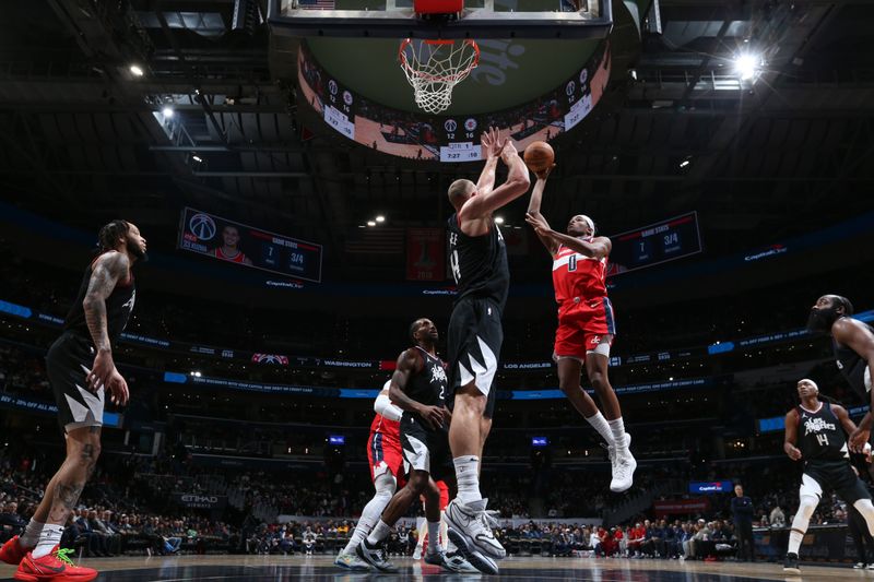 WASHINGTON, DC -? JANUARY 31:  Bilal Coulibaly #0 of the Washington Wizards goes to the basket during the game on January 31, 2024 at Capital One Arena in Washington, DC. NOTE TO USER: User expressly acknowledges and agrees that, by downloading and or using this Photograph, user is consenting to the terms and conditions of the Getty Images License Agreement. Mandatory Copyright Notice: Copyright 2024 NBAE (Photo by Stephen Gosling/NBAE via Getty Images)