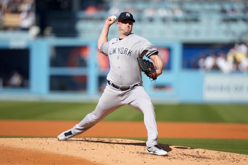 Jun 3, 2023; Los Angeles, California, USA; New York Yankees starting pitcher Gerrit Cole (45) throws in the second inning against the Los Angeles Dodgers at Dodger Stadium. Mandatory Credit: Kirby Lee-USA TODAY Sports