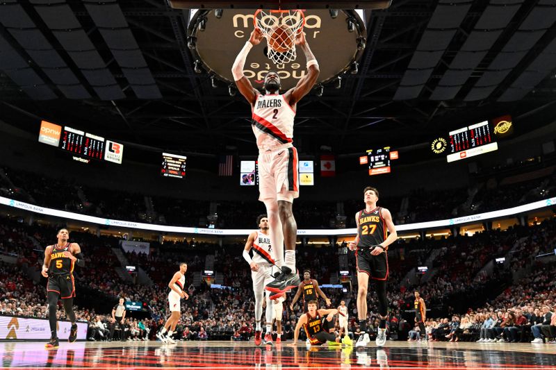 PORTLAND, OREGON - MARCH 13: Deandre Ayton #2 of the Portland Trail Blazers dunks the ball during the second quarter of the game against the Atlanta Hawks at the Moda Center on March 13, 2024 in Portland, Oregon. The Portland Trail Blazers won 106-102. NOTE TO USER: User expressly acknowledges and agrees that, by downloading and or using this photograph, User is consenting to the terms and conditions of the Getty Images License Agreement. (Photo by Alika Jenner/Getty Images)