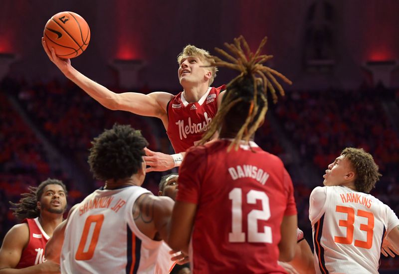 Jan 31, 2023; Champaign, Illinois, USA; Nebraska Cornhuskers guard Sam Griesel (5) drives to the basket during the second half against the Illinois Fighting Illini at State Farm Center. Mandatory Credit: Ron Johnson-USA TODAY Sports