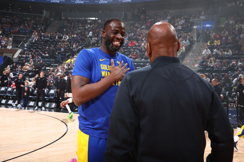 SALT LAKE CITY, UT - FEBRUARY 15: Draymond Green #23 of the Golden State Warriors talks with referee Derek Richardson #63 before the game on February 15, 2024 at Delta Center in Salt Lake City, Utah. NOTE TO USER: User expressly acknowledges and agrees that, by downloading and or using this Photograph, User is consenting to the terms and conditions of the Getty Images License Agreement. Mandatory Copyright Notice: Copyright 2024 NBAE (Photo by Melissa Majchrzak/NBAE via Getty Images)