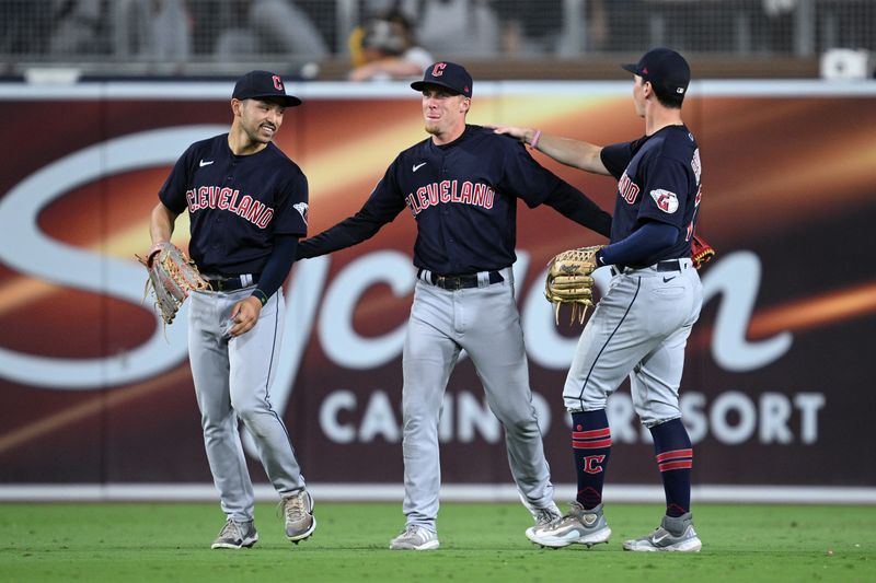 Jun 15, 2023; San Diego, California, USA; Cleveland Guardians center fielder Myles Straw (7) celebrates with left fielder Steven Kwan (38) and right fielder Will Brennan (17) after defeating the San Diego Padres at Petco Park. Mandatory Credit: Orlando Ramirez-USA TODAY Sports