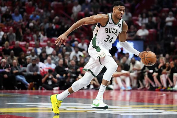 MIAMI, FLORIDA - NOVEMBER 28: Giannis Antetokounmpo #34 of the Milwaukee Bucks dribbles the ball up the court against the Miami Heat in the first quarter during the NBA In-season Tournament game at Kaseya Center on November 28, 2023 in Miami, Florida. NOTE TO USER: User Expressly acknowledges and agrees that, by downloading and or using this photograh, User is consenting to the terms and conditions of the Getty Images License Agreement. (Photo by Rich Storry/Getty Images)