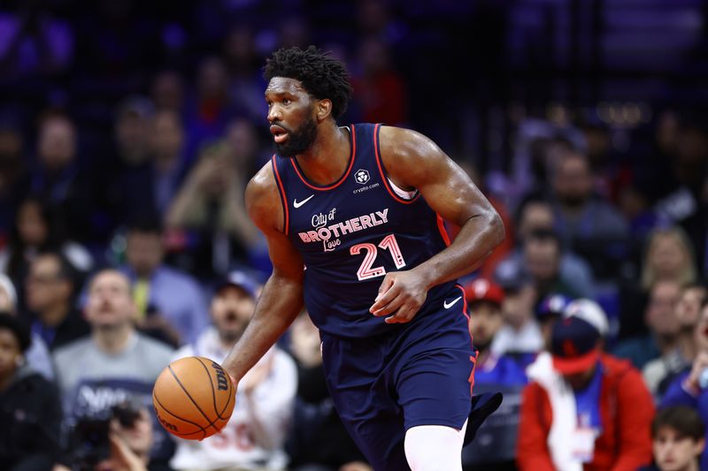 PHILADELPHIA, PENNSYLVANIA - NOVEMBER 14: Joel Embiid #21 of the Philadelphia 76ers dribbles during the fourth quarter against the Indiana Pacers at the Wells Fargo Center on November 14, 2023 in Philadelphia, Pennsylvania. NOTE TO USER: User expressly acknowledges and agrees that, by downloading and or using this photograph, User is consenting to the terms and conditions of the Getty Images License Agreement. (Photo by Tim Nwachukwu/Getty Images)