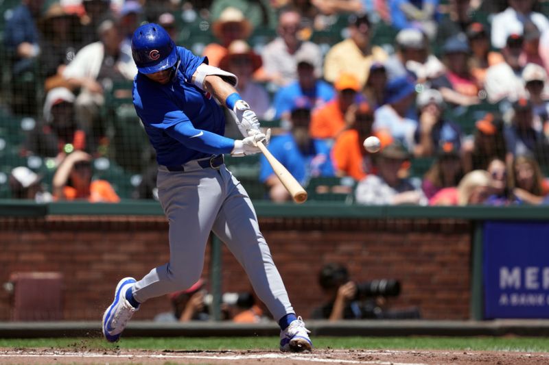 Jun 27, 2024; San Francisco, California, USA; Chicago Cubs second baseman Nico Hoerner (2) hits a home run against the San Francisco Giants during the third inning at Oracle Park. Mandatory Credit: Darren Yamashita-USA TODAY Sports