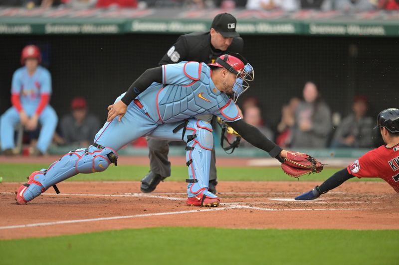 May 27, 2023; Cleveland, Ohio, USA; St. Louis Cardinals catcher Willson Contreras (40) is late with the tag as Cleveland Guardians left fielder Steven Kwan (38) scores during the third inning at Progressive Field. Mandatory Credit: Ken Blaze-USA TODAY Sports